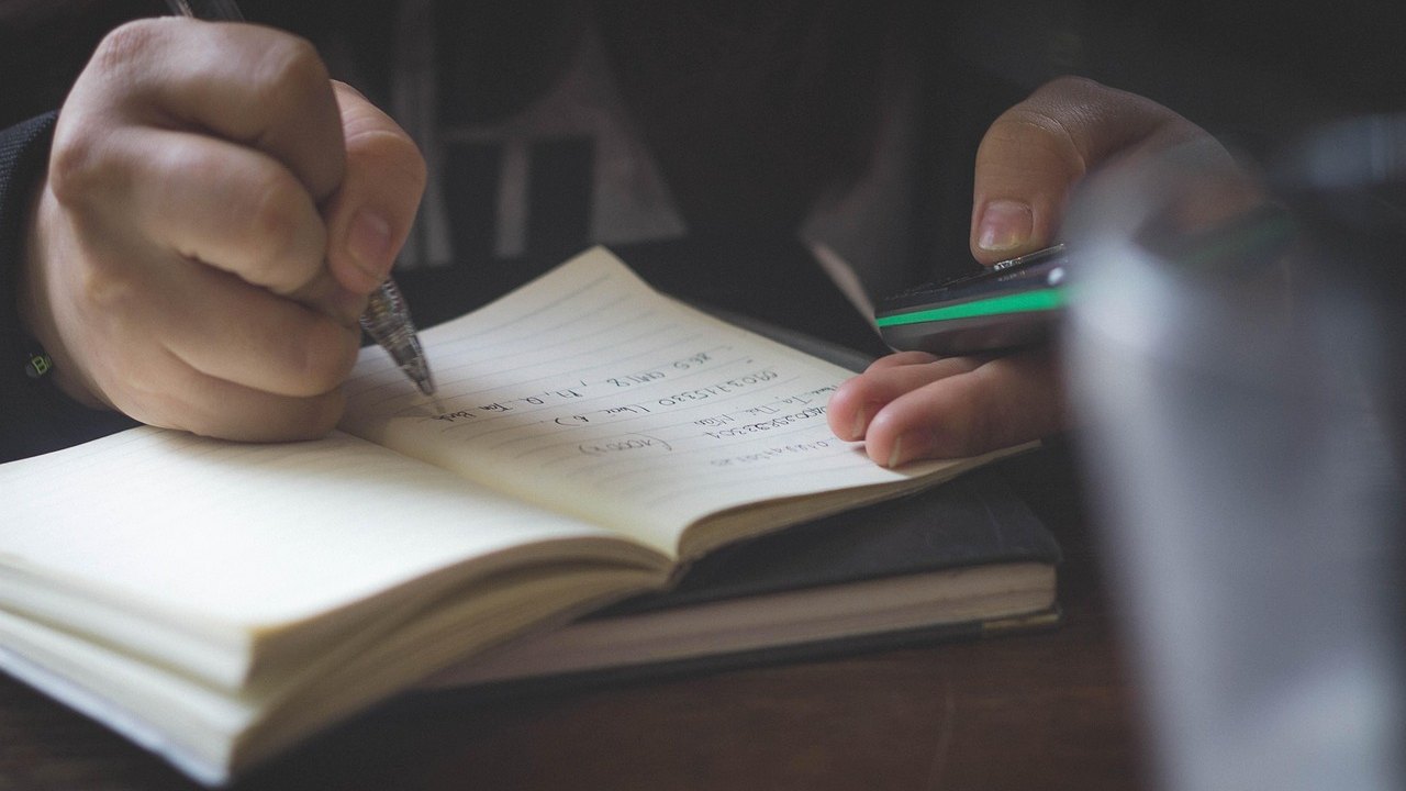 medical students studying textbooks and notes