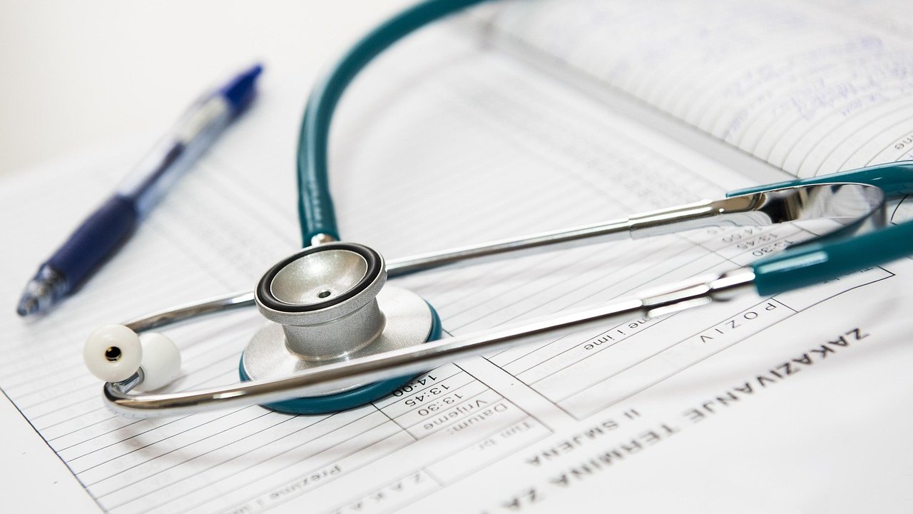 doctor reviewing medical documents