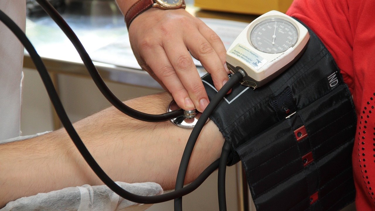 doctor measuring blood pressure