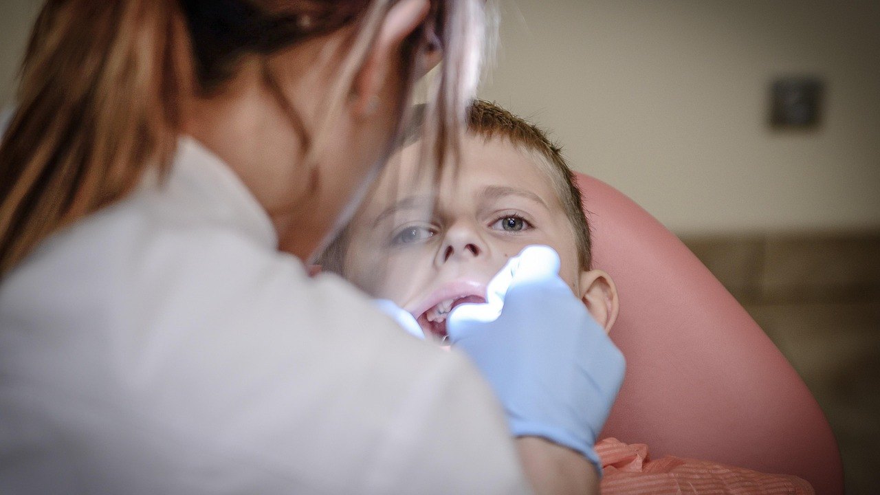 child at pediatric dental checkup