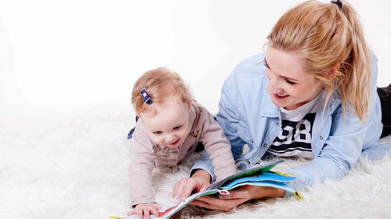 young mother with child silhouette at home